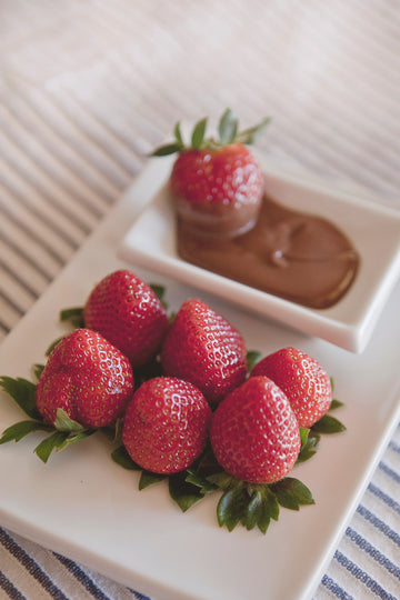 Organic strawberries in hemp     honey-ed chocolate